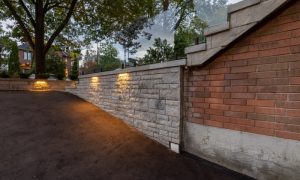 custom retaining wall glass railings lighting