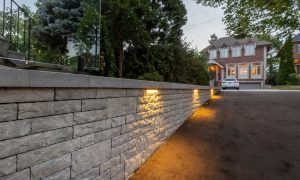 custom retaining with wall glass railings lighting